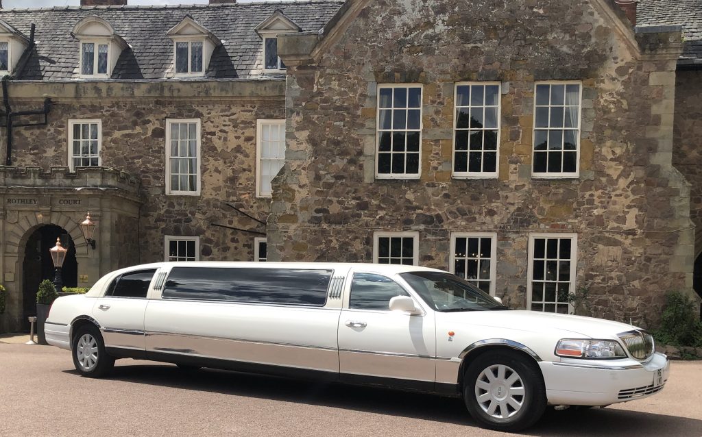Birmingham Lincoln Town car beside park
